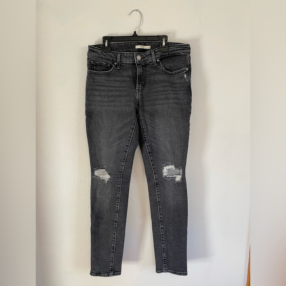 Levi’s 711 Black Distressed Skinny Jeans